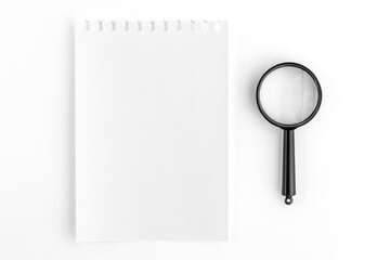 Notepad Page with Magnifying Glass. Check List Concept.