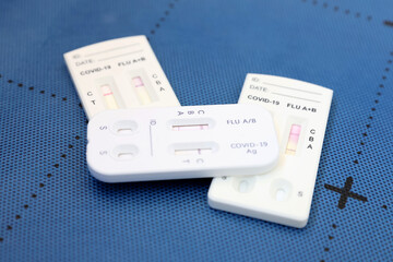 A combo antigen test is use for a proper diagnosis for covid-19 and A/B flu positive test result by using rapid test cassette.