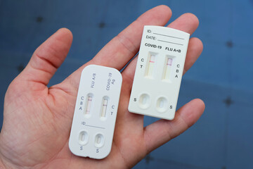 A combo antigen test is use for a proper diagnosis for covid-19 and A/B flu positive test result by using rapid test cassette.
