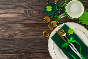 Revel in St. Patric's Day spirit at the pub scene. Top view snapshot of a table adorned with plate,...