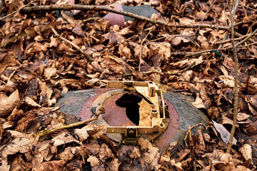 Broken Cathode Electron Beam Tube of Old TV, shattered television trash in the woods, littering in...