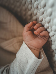 Hand of a newborn baby close-up, concept of happy motherhood