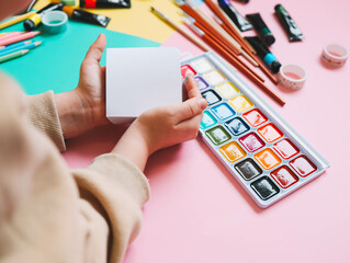 Back to school. Panoramic education banner. Top view, flat lay. Colorful supplies on table, colored paper. Children's creativity concept. Preschool study, development. Accessories for the schoolroom