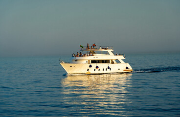 Tourist boat at sea with tourists