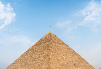 Fototapeta na wymiar Flying over the Egyptian Pyramid of Cheops on a glider