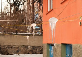 Ice on clothesline. weather -50 degrees during winter. Erzurum, Turkey travel. Common issue your...