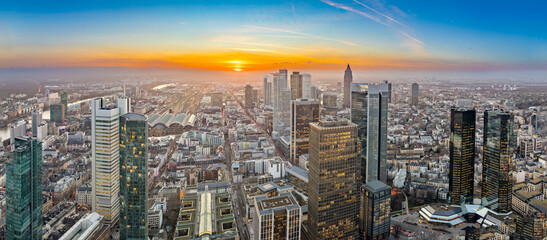 aerial view to skyline of Frankfurt with skyscraper in dawn and spectacular sunset - obrazy, fototapety, plakaty