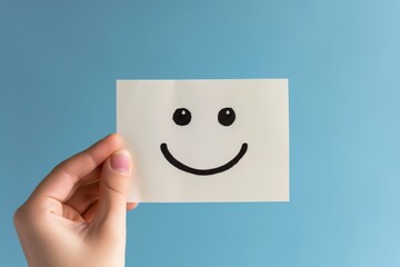 Obraz premium Happy Smiley Emoji positive energy Emoticon, colored Symbol symbolic art. Smiling face feedback aggregation. Joyfull radiant big smile. solution focused therapy client rating and customer feedback