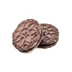 Two cream-filled chocolate sandwich cookies, ideal for breakfast and dipping in milk.