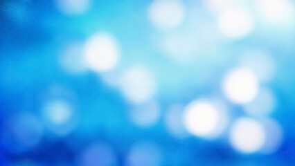a blue and white photo of a blurry background with bokeh effects.