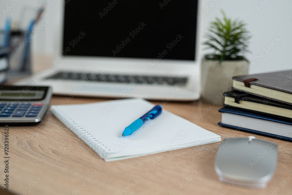 Poster empty notepad with pen laptop calculator coffee on a office wooden surface, nobody.