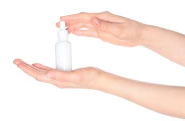 Woman hands holding a white cosmetic bottle, isolated on white background close-up, template for cosmetics ads