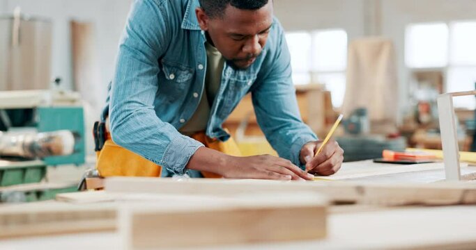 Construction, wood and planning with black man in workshop for manufacturing, measure and building. Hardware, remodeling and maintenance with carpenter in small business for timber and production
