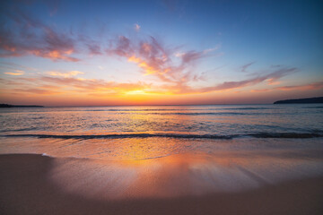Beautiful sunrise with cloudscape over the sea and beach, scenic ocean sunset - 728413398