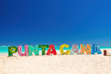 Punta Cana Bavaro beach resort and color letters on the sea sand, summer tropical caribbean vacation - 728414514