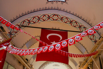 The Turkish flag proudly displayed at the top of the Grand Bazaar, creating a patriotic and vibrant...