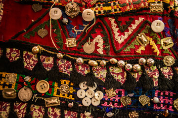 A vibrant display of lots of buttons in the traditional Turkish bazaar, showcasing unique...