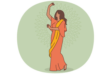 Obraz premium Happy woman in indian clothing dancing