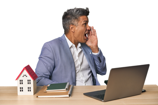 Middle-aged Hispanic businessman with real estate theme shouting and holding palm near opened mouth. - Powered by Adobe