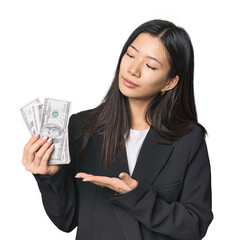 Chinese businesswoman with money