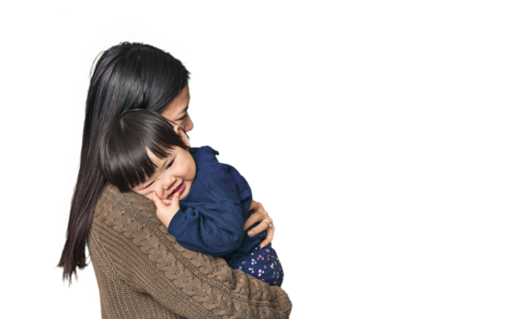 Happy Chinese mother hugging her child