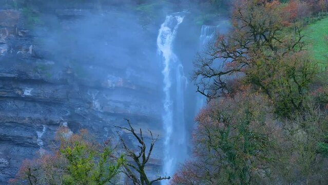 Gujuli or Goiuri waterfall in winter, in the municipality of Urkabustaiz. Aerial view from a drone. Gujuli. Alava. Basque Country. Spain. Europe