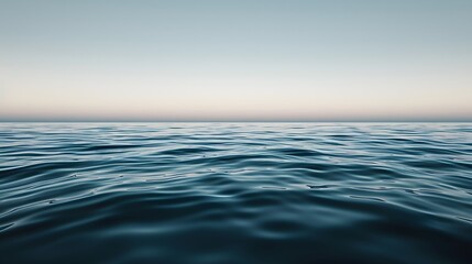 Blue deep ocean surface panorama with soft waves, background, sky and ocean. copy space. 
