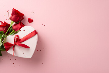 Dream woman's holiday idea. Top view of a premium rose bouquet, trendy heart-shaped gift packaging,...