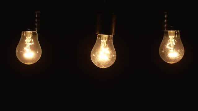 Switch on, turn off light bulbs. Warm yellow light