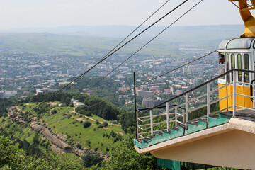 Mountain Cable Car. Old Cabin Cable Car Against the Backdrop of the City.