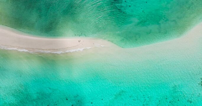 Beautiful waves over the sandbar. Bon Bon Sandbank with transparent sea water. Romblon Island. Romblon, Philippines.