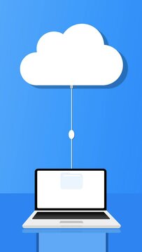 Un ordinateur portable envoie des donn&eacute;es dans le cloud