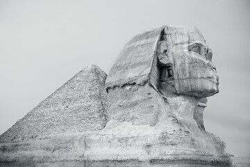 The great sphinx of Giza near the great pyramid, the oldest of the seven wonders of the world...
