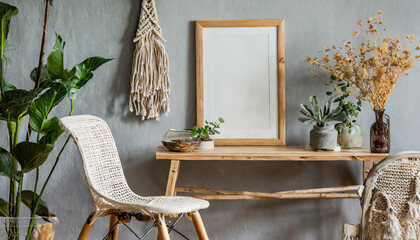 Design home interior of living room with stylish chair and wooden desk, plants, flowers, table lamp, mock up poster frame, macrame and elegant accessories. Stylish home decor