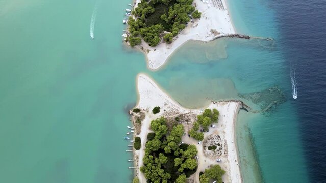 Cinematic overhead 4K drone clip over a peninsula in Paliouri, Chalkidiki in North Greece