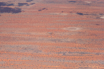 little farm and dune stripes in Kalahari, east of Mariental, Namibia
