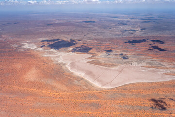 large pan and red dunes in Kalahari, east of Mariental, Namibia