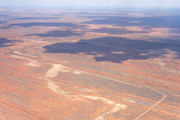 little airfield with sand runway and dune stripes of Kalahari,  Pokweni, Namibia