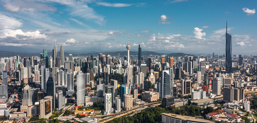 Fototapeta premium Panorama of Kuala Lumpur on a sunny day. Aerial view