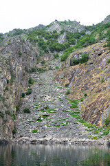 Fototapeta na wymiar Vineyards on the steep slopes of the Sil river canyon in the Ribeira Sacra area. Galicia - Spain