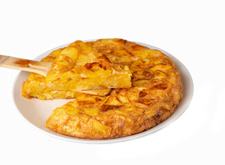 Spanish omelette with potatoes, typical spanish cuisine on gray concrete floor. Tortilla Espanola. Turkish name; Yumurtali patates