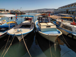 Obraz premium Marina with fishing boats in the port of Kusadasi, Türkiye