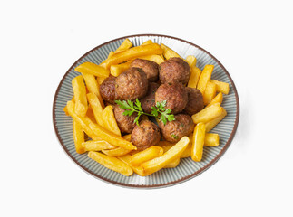 Round shaped balls of dry meatballs and french fries. Turkish name; kuru kofte ve patates