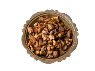 Muslims Traditional Sacrifice holiday food lamb, Turkish roasted meat in copper pot on table top. Turkish Kavurma. (Turkish name; Kurban kavurma)