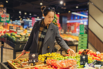 Young Woman Selecting Fresh Produce at Grocery Store