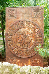 solar calendar of the Maya formed by circle of 19 months glyphs forms of the haab and a  time-bearing god