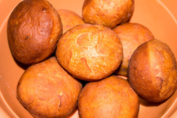 Delicious donuts are made by hand in the kitchen