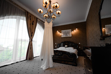 The bride's wedding dress before the wedding ceremony.