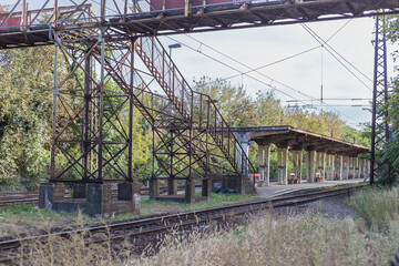 Derelict train platform covered in grafitti - 728502725