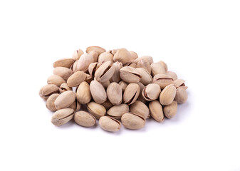 Salted roasted pistachios isolated over white background
